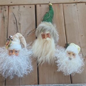 Trio of vintage Santa head ornaments